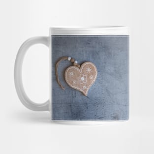 Brown heart pendant on grey surface Mug